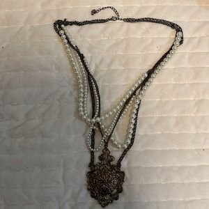 Beautiful vintage necklace with pearls and medallion